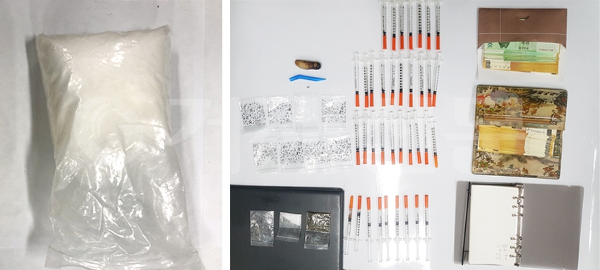 거제경찰서가 코카인·필로폰·대마 등 마약류를 유통한 83명을 검거하고 이중 28명을 구속했다. 사진은 경찰이 압수한 코카인 봉지(왼쪽)와 주사기에 든 필로폰(60.93g).